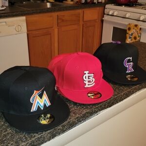 New Era MLB Team Caps in Black, Red, and Black